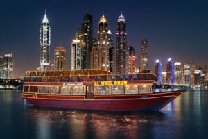 Dhow Cruise Dubai Marina with illuminated skyline at night